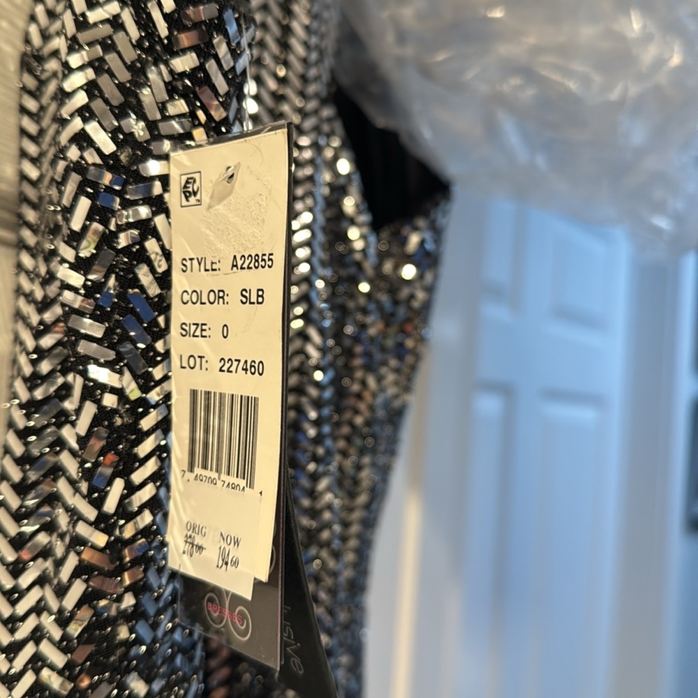 Silver Sequin Gown never worn size 0 purchased at Bloomingdale’s. - Picture 11 of 11